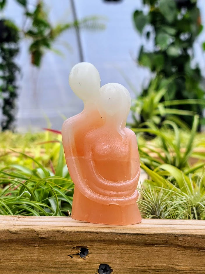 Couple Hugging Luminous Carving